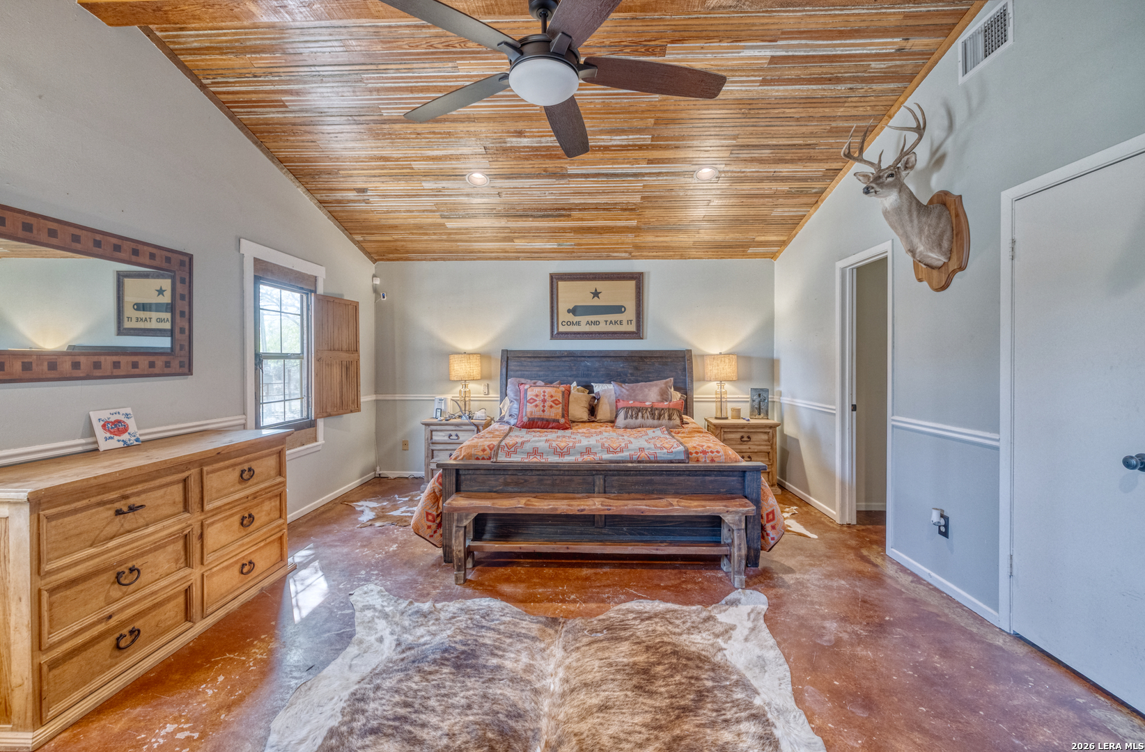 160 Beavers Trail Uvalde, TX 78801 - Photo 16 of 53 a spacious bedroom with a bed and a dresser