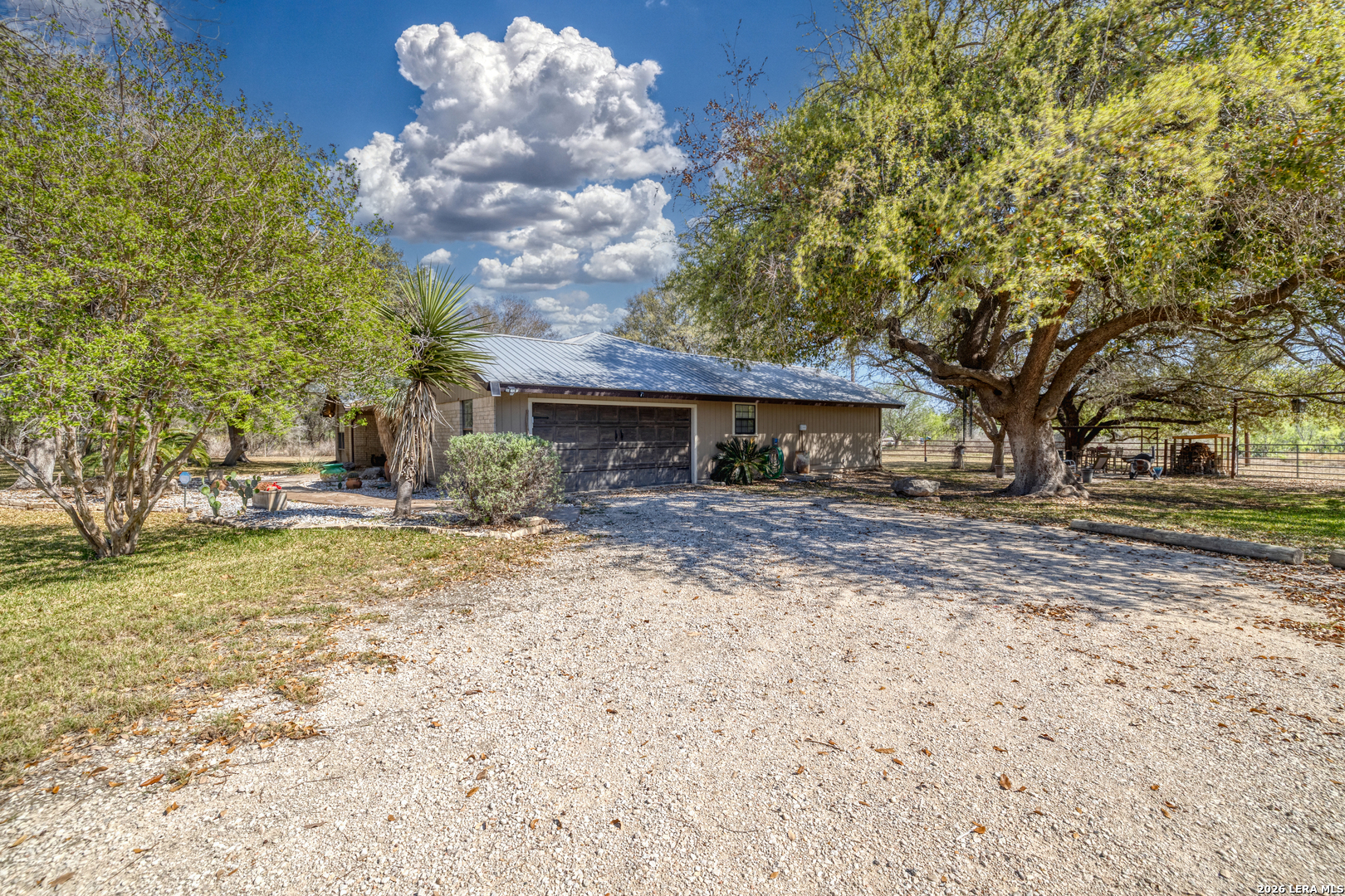 160 Beavers Trail Uvalde, TX 78801 - Photo 22 of 53 a front view of a house with garden