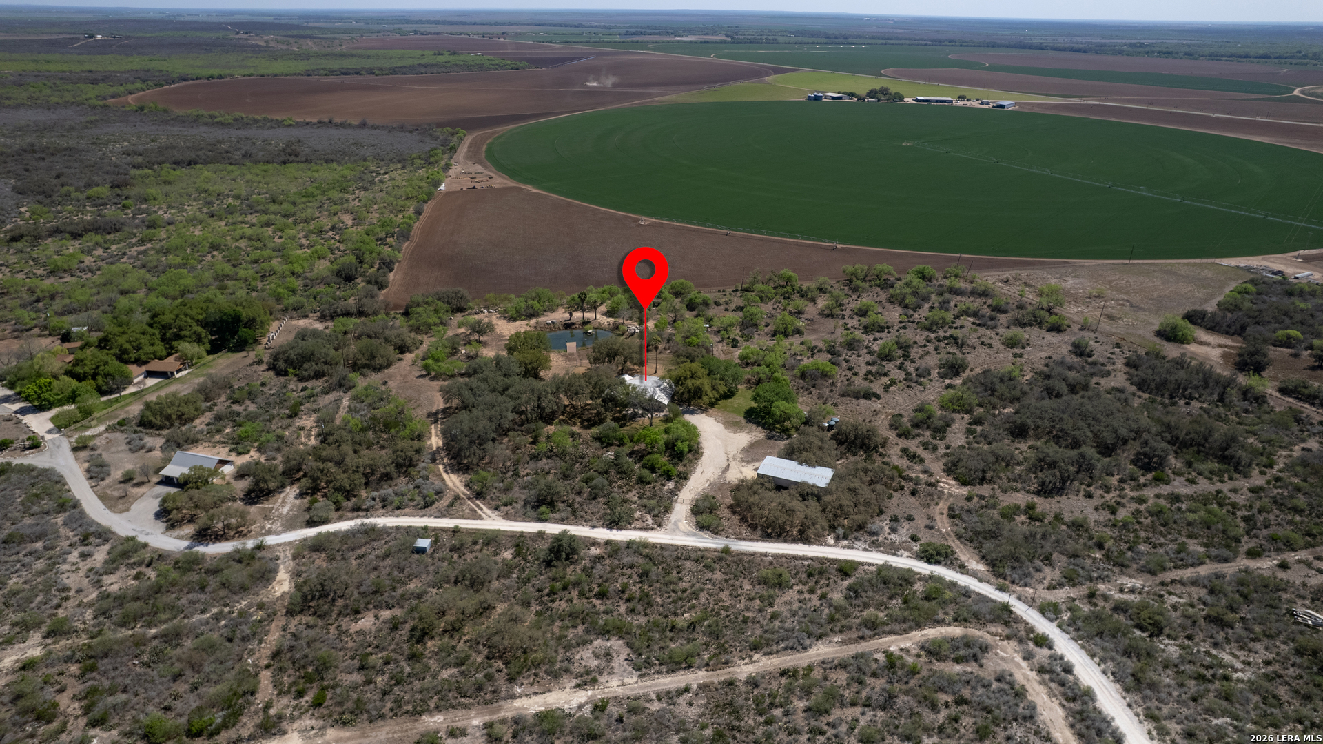 160 Beavers Trail Uvalde, TX 78801 - Photo 24 of 53 a view of a back yard of a house