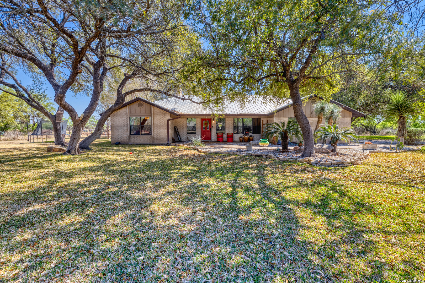 160 Beavers Trail Uvalde, TX 78801 - Photo 30 of 53 a view of a house with a yard porch and sitting area
