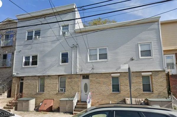 a front view of a house with windows
