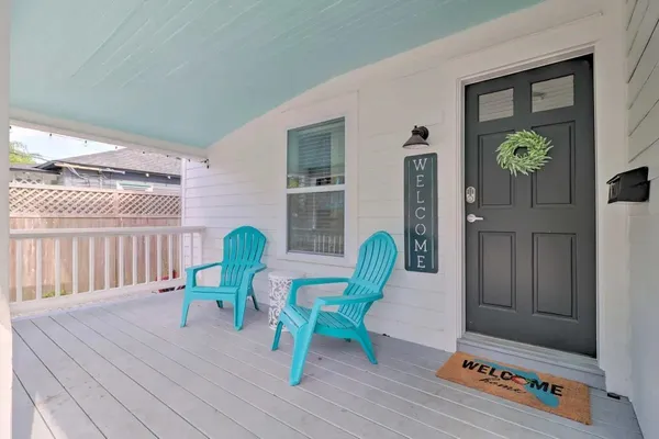 a kitchen with a sink a refrigerator a stove and cabinets