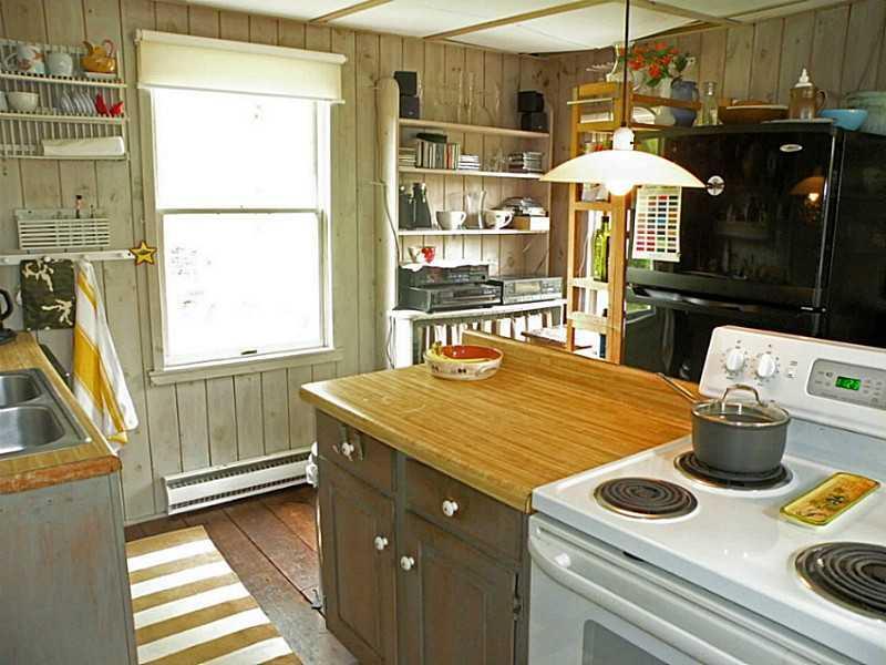 70 Chauncey Creek Road Kittery Point, ME 03905 - Photo 10 of 15 Kitchen. Kitchen work area hardwood...