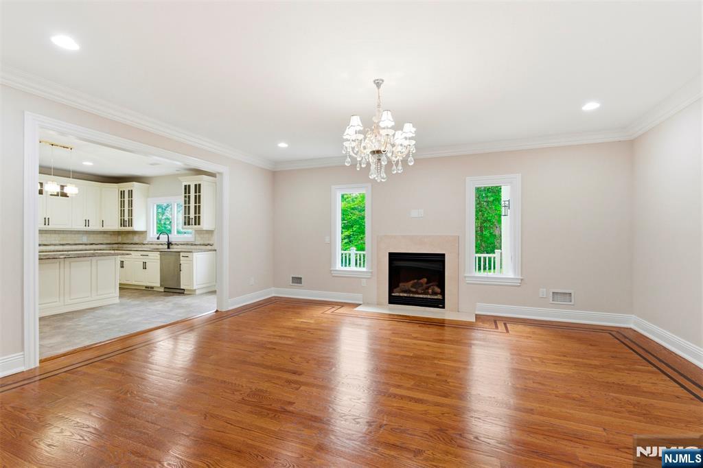 767 Orangeburgh Road River Vale, NJ 07675 - Photo 11 of 49 a view of a kitchen with furniture and a fireplace