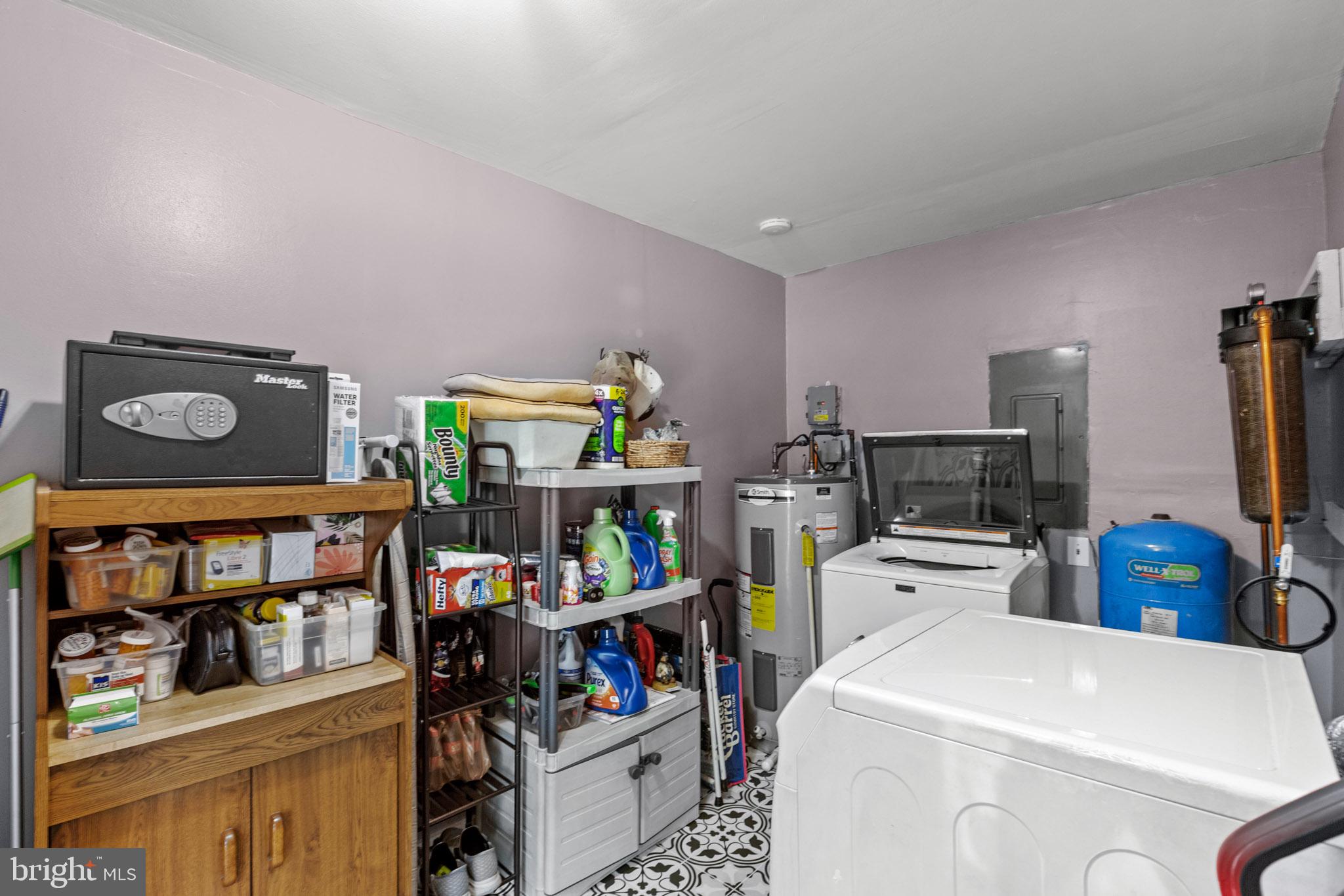 22508 Old Rolling Road California, MD 20619 - Photo 20 of 34 Functional laundry space with storage.