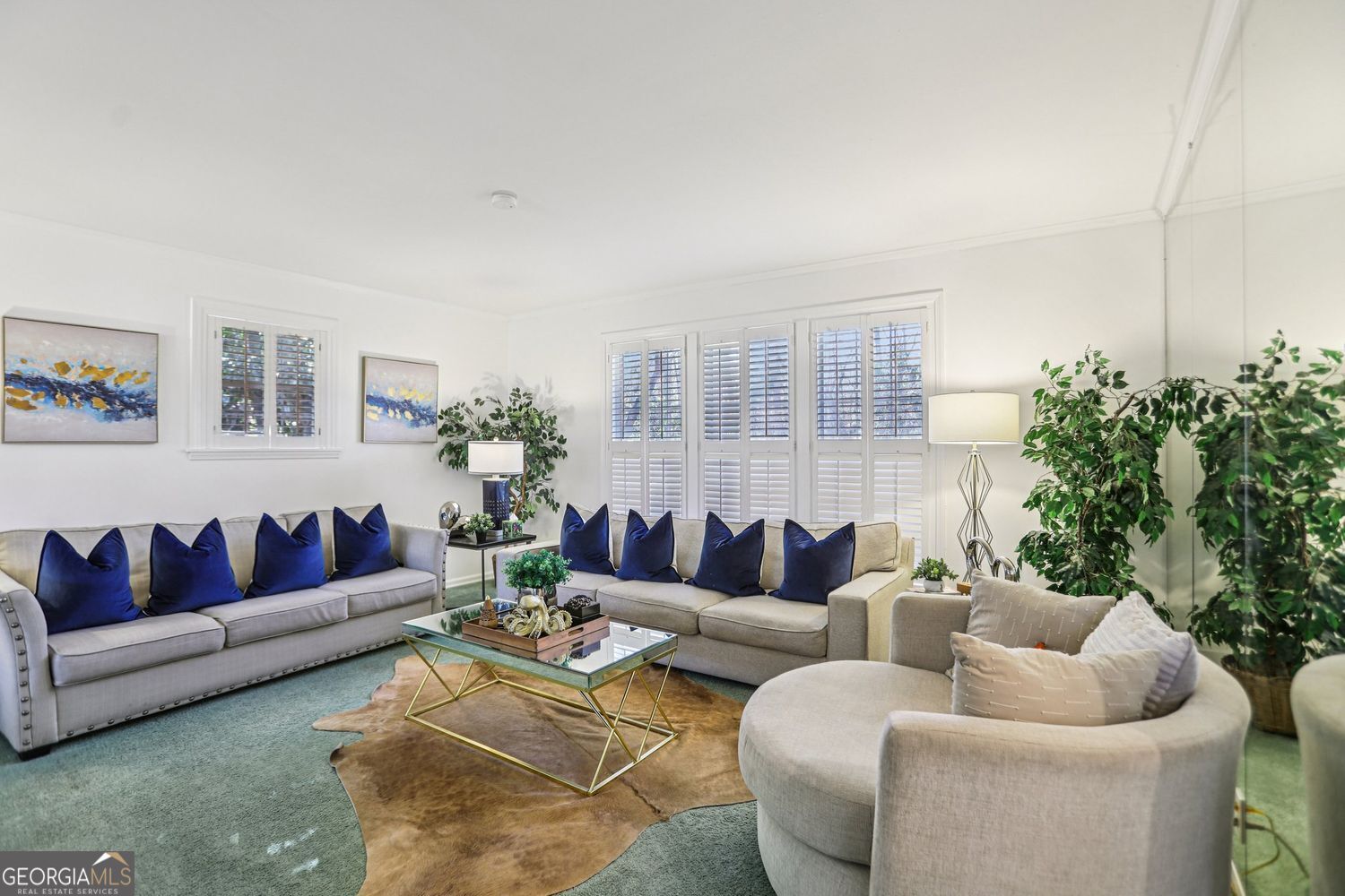 129 Tye Street Stockbridge, GA 30281 - Photo 3 of 27 a living room with furniture and a potted plant