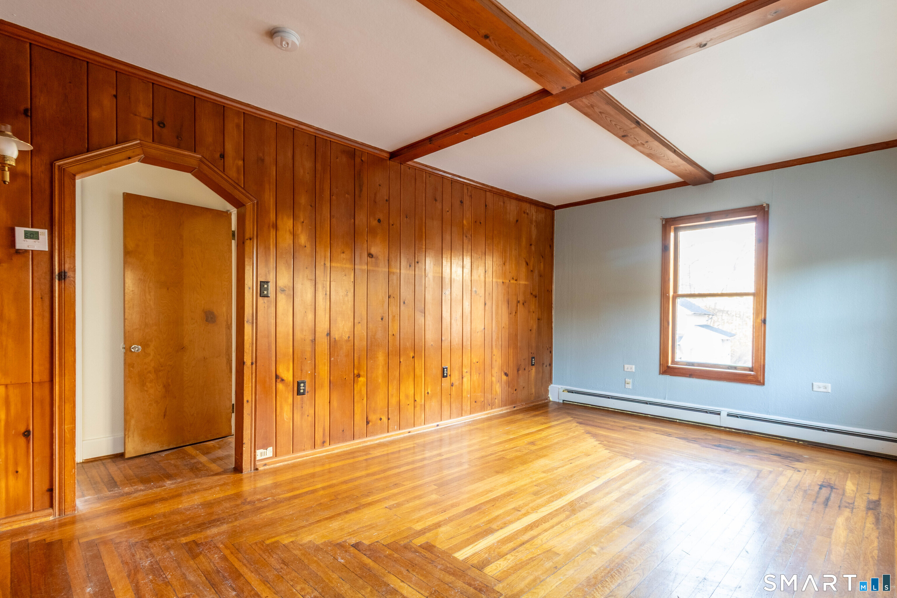 1661 Center Groton Road Ledyard, CT 06339 - Photo 14 of 39 a view of an empty room with window and bathroom