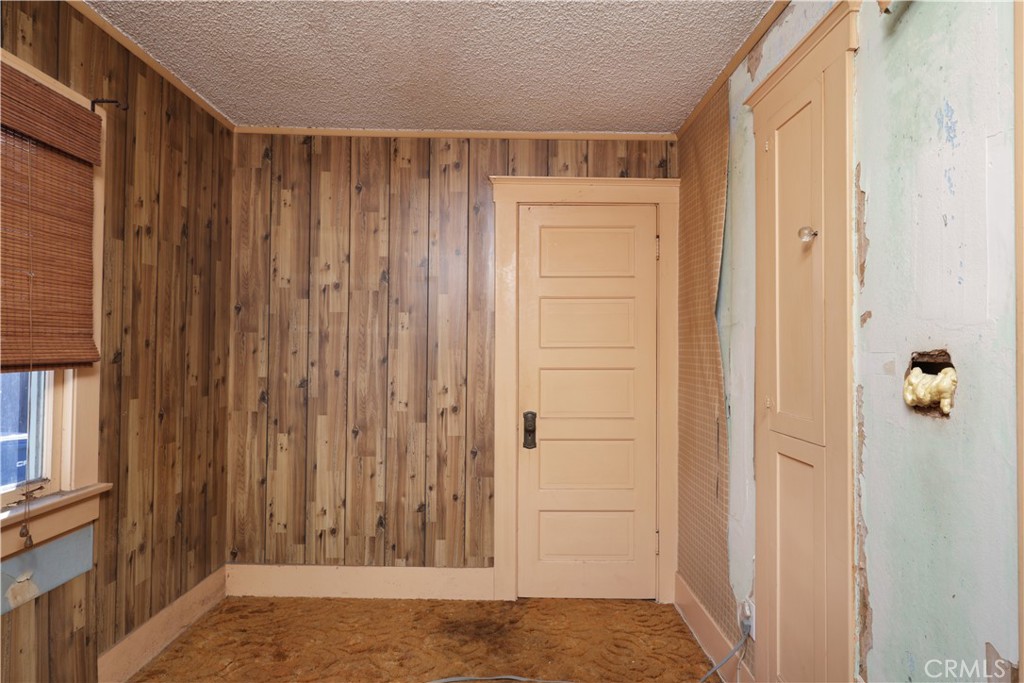 9211 Walnut Street Bellflower, CA 90706 - Photo 11 of 26 a view of wooden door