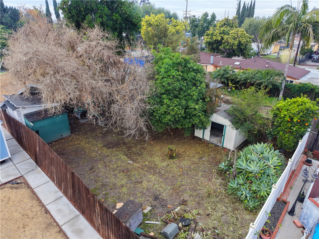 9211 Walnut Street Bellflower, CA 90706 - Photo 23 of 26 a view of a backyard