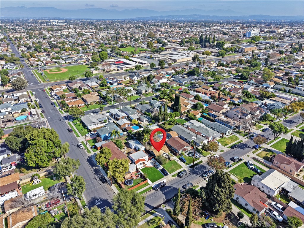 9211 Walnut Street Bellflower, CA 90706 - Photo 24 of 26 an aerial view of multiple house