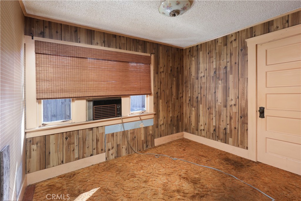 9211 Walnut Street Bellflower, CA 90706 - Photo 10 of 26 a view of an empty room with a window