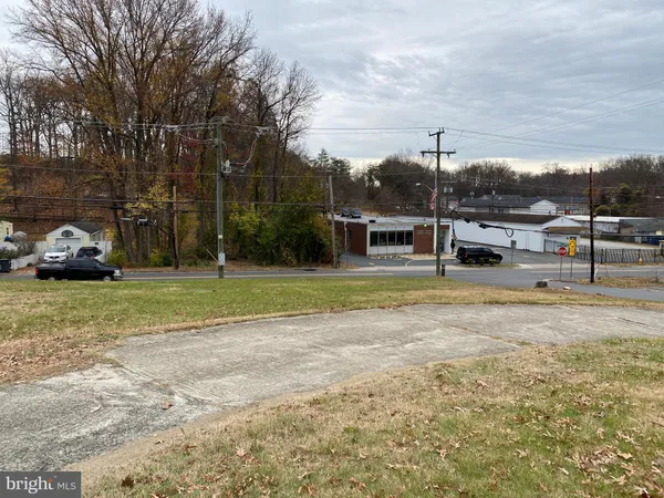 a view of a house with a big yard