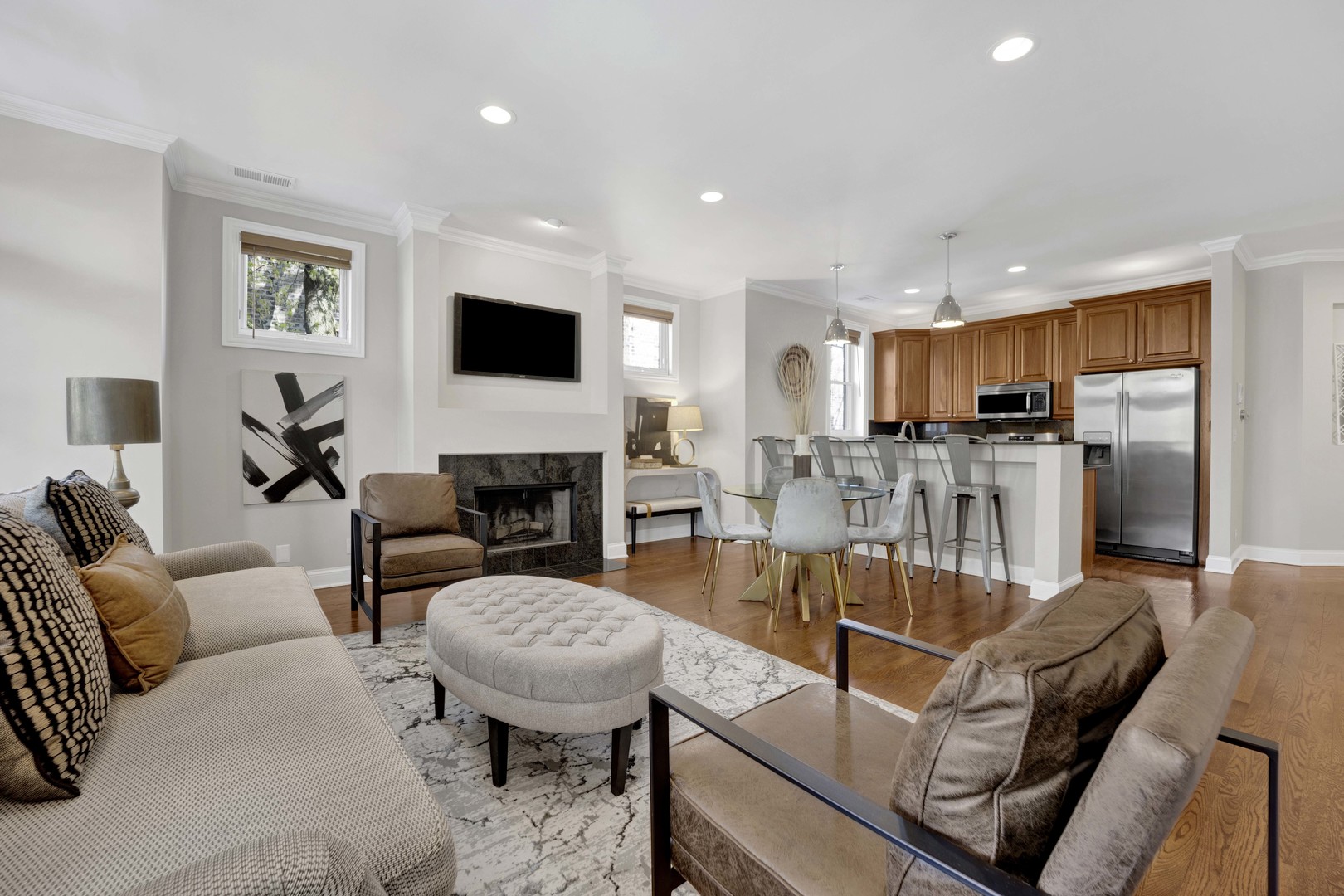 4543 North Malden Street, Unit 2N Chicago, IL 60640 - Photo 2 of 25 a living room with furniture and a fireplace