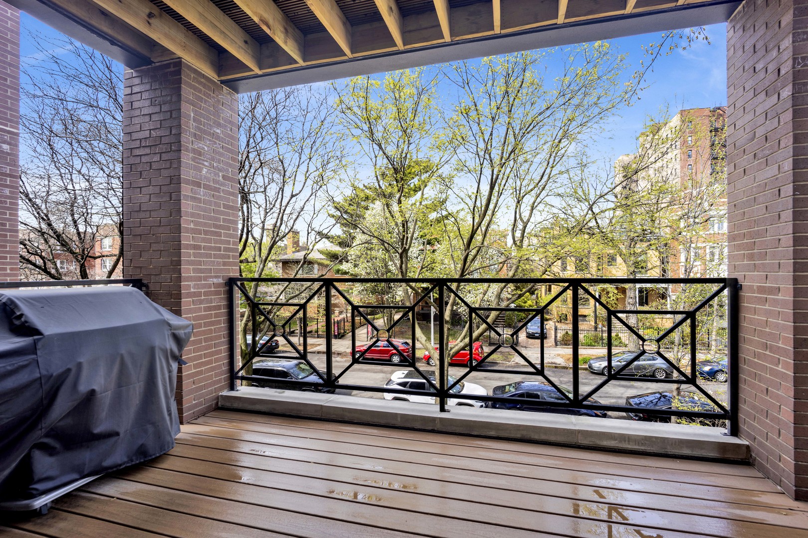 4543 North Malden Street, Unit 2N Chicago, IL 60640 - Photo 22 of 25 a view of a balcony with furniture and sign