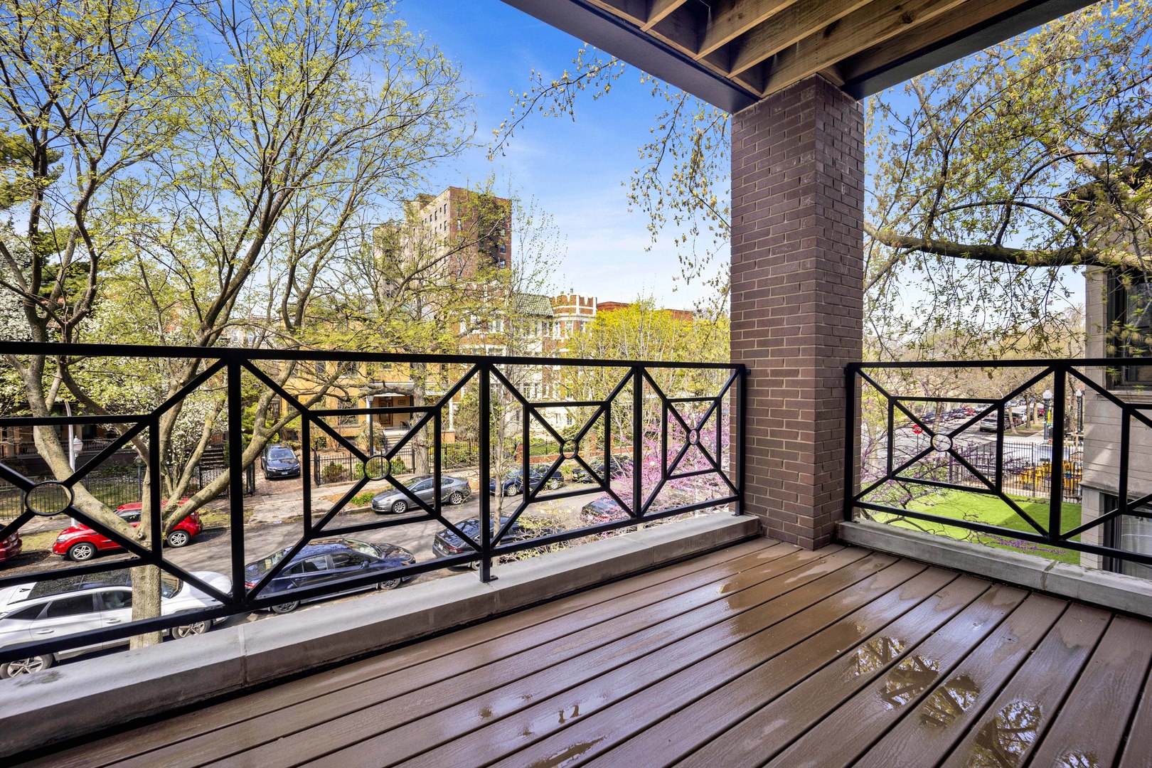 4543 North Malden Street, Unit 2N Chicago, IL 60640 - Photo 23 of 25 a view of a balcony with wooden floor and bench
