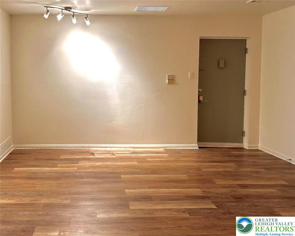 1575 Creekside Road, Unit A2 Whitehall, PA 18052 - Photo 11 of 21 a view of a room with wooden floor