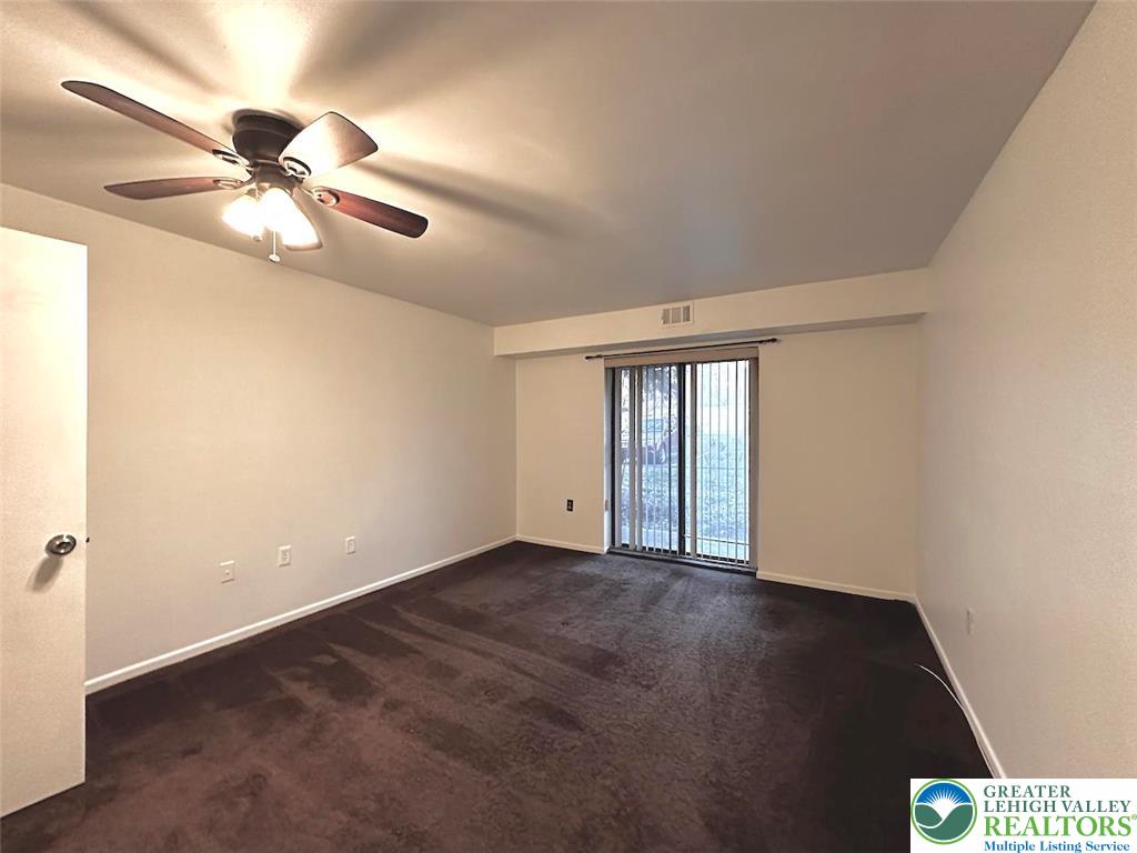 1575 Creekside Road, Unit A2 Whitehall, PA 18052 - Photo 12 of 21 a view of an empty room with a window