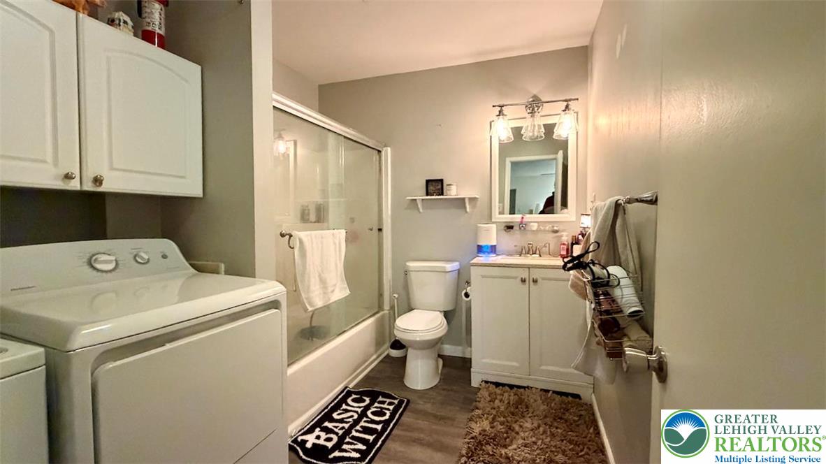 1575 Creekside Road, Unit A2 Whitehall, PA 18052 - Photo 18 of 21 a bathroom with a sink toilet and shower