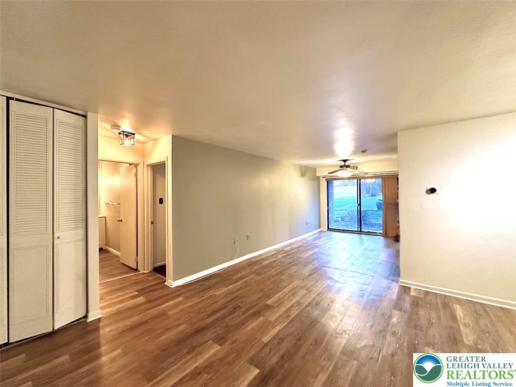 1575 Creekside Road, Unit A2 Whitehall, PA 18052 - Photo 9 of 21 a view of a hallway with wooden floor