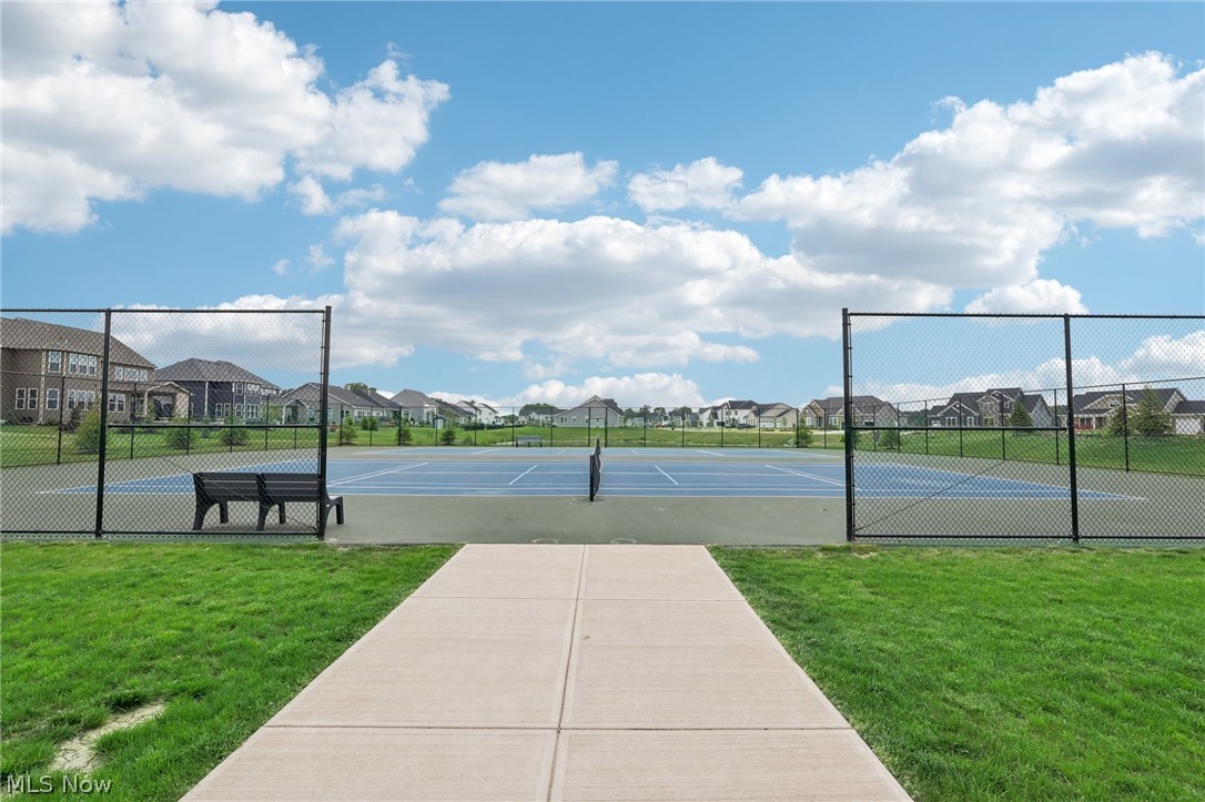 36602 Amalfi Road North Ridgeville, OH 44039 - Photo 40 of 49 View of sport court with a yard