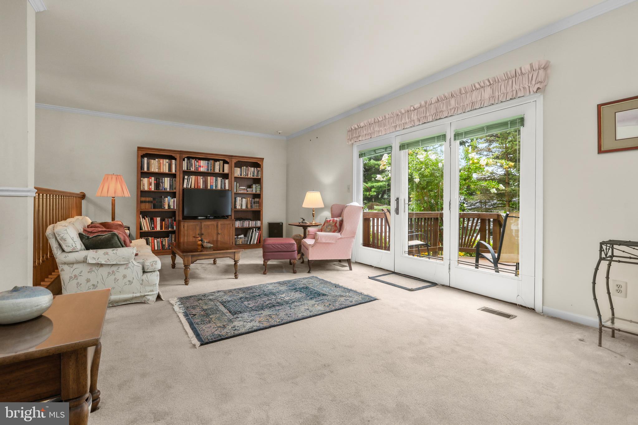 741 Burgh Westra Way Abingdon, MD 21009 - Photo 18 of 48 a living room with furniture and a floor to ceiling window