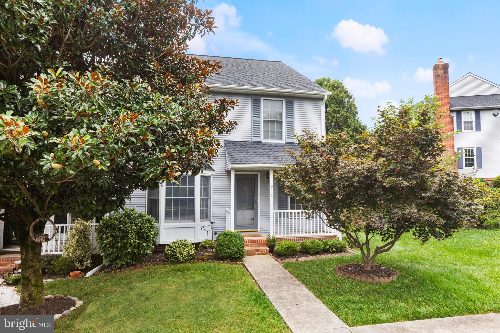 741 Burgh Westra Way Abingdon, MD 21009 - Photo 2 of 48 a front view of a house with a yard and trees