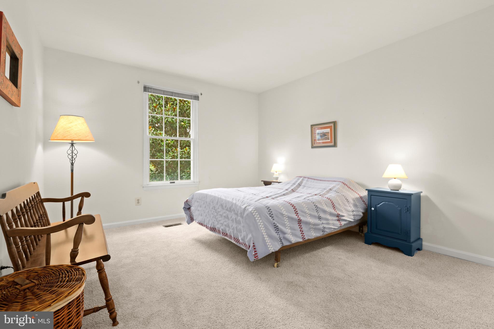 741 Burgh Westra Way Abingdon, MD 21009 - Photo 30 of 48 a bedroom with a bed chair and a lamp