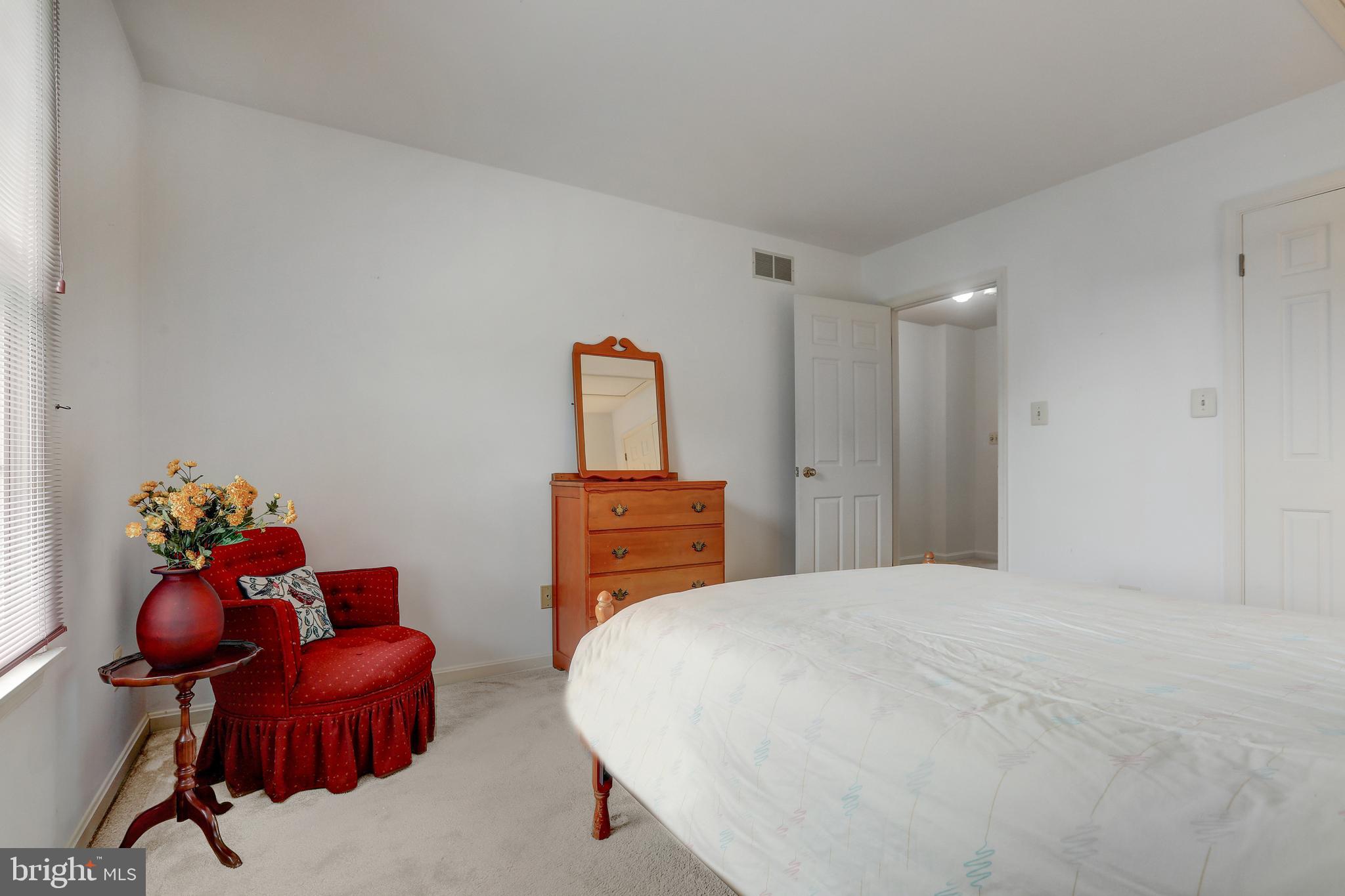 741 Burgh Westra Way Abingdon, MD 21009 - Photo 33 of 48 a bedroom with furniture and a chair