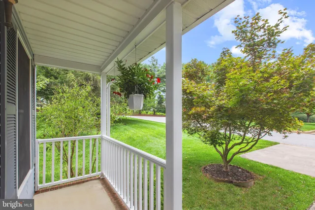 a view of a porch and a yard