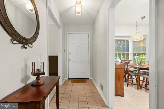 a view of a livingroom with furniture and window