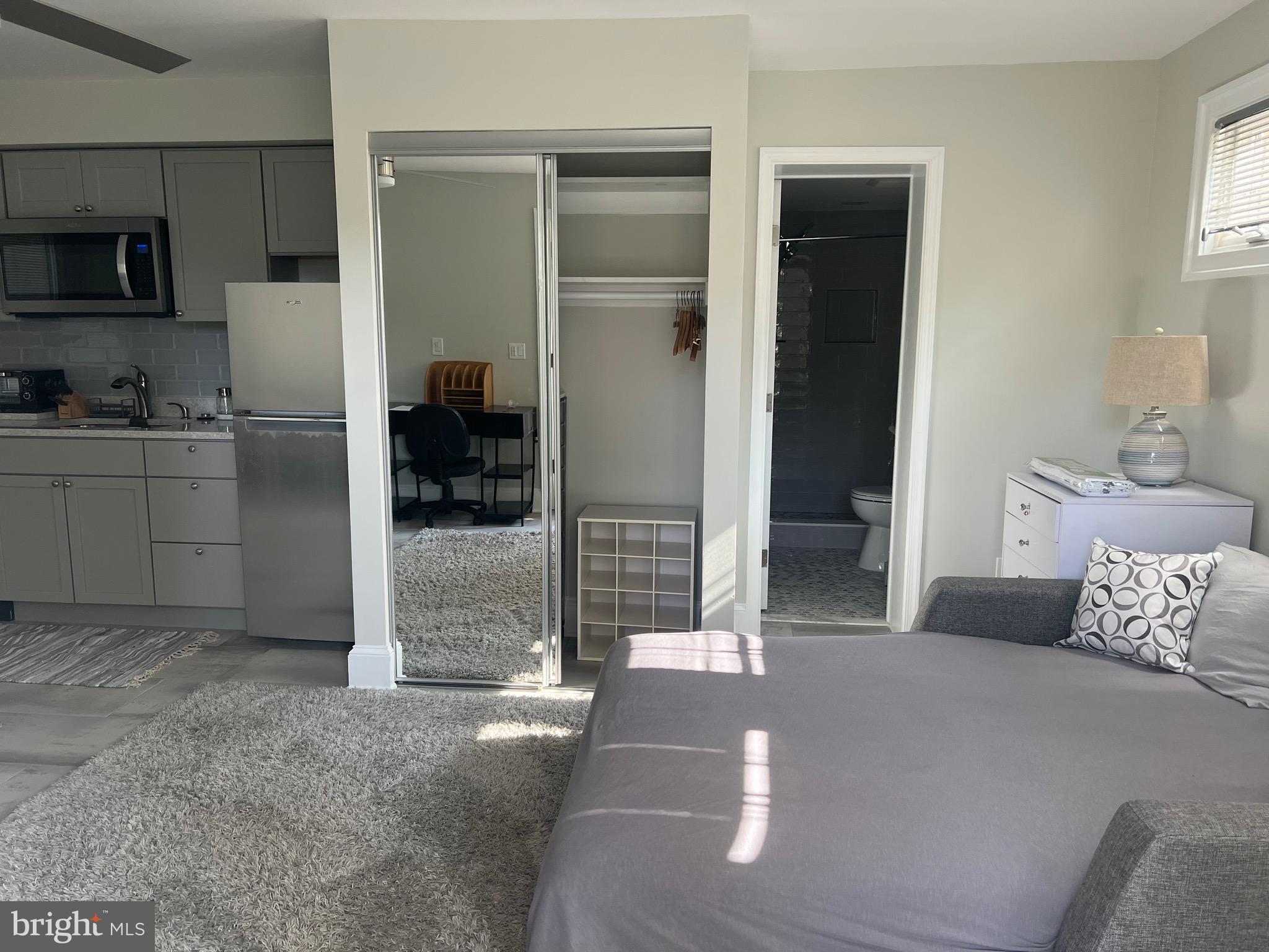 7703 Newcastle Drive Annandale, VA 22003 - Photo 11 of 12 a bedroom with a bed and a television