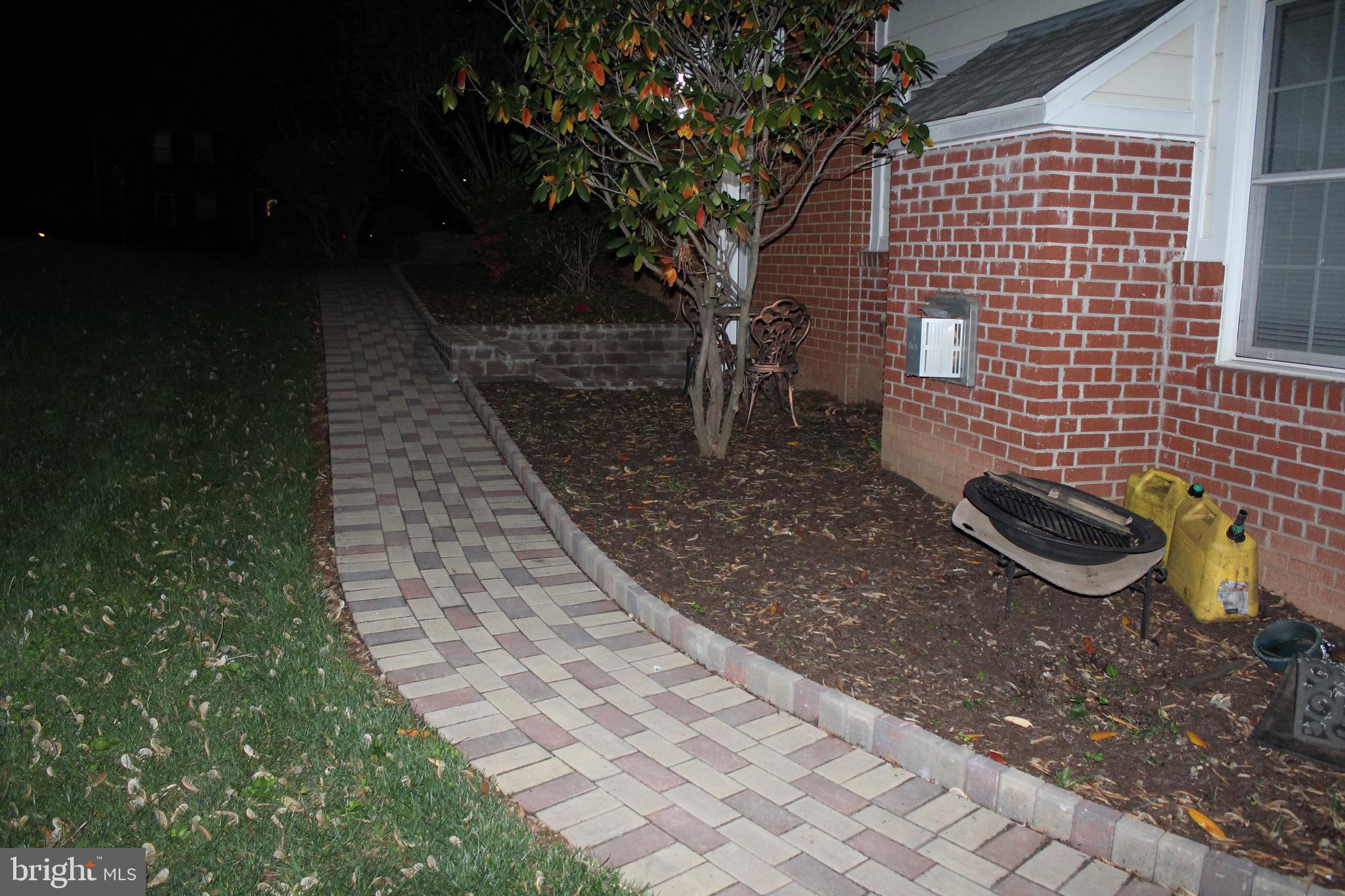 7703 Newcastle Drive Annandale, VA 22003 - Photo 5 of 12 a view of a backyard with of the house