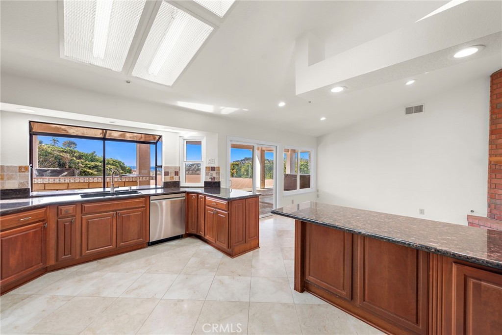 2847 Calle Heraldo San Clemente, CA 92673 - Photo 3 of 16 A cook's dream kitchen with lots of cabinet space and room for food preparation.