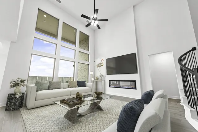 a living room with furniture or couch and a flat screen tv