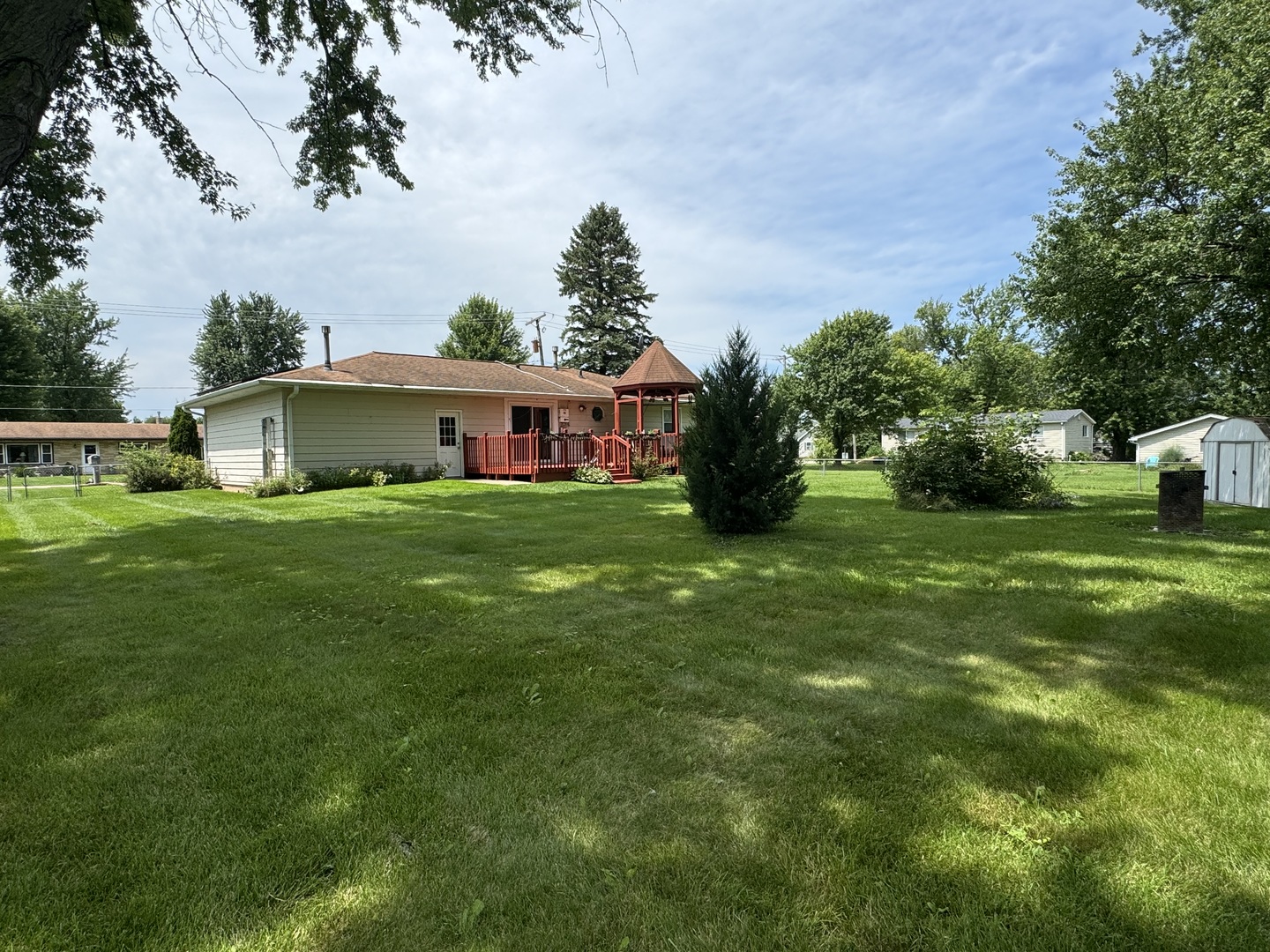 7912 Elm Street Harvard, IL 60033 - Photo 28 of 37 a view of a house with a big yard