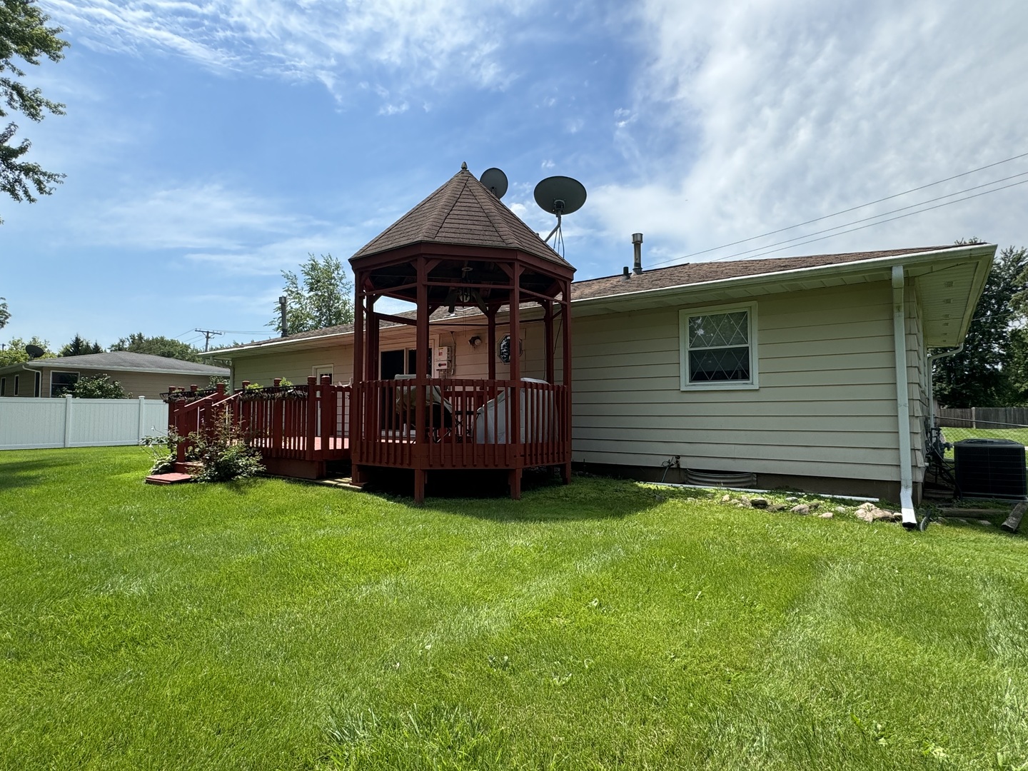 7912 Elm Street Harvard, IL 60033 - Photo 30 of 37 a view of a house with a backyard