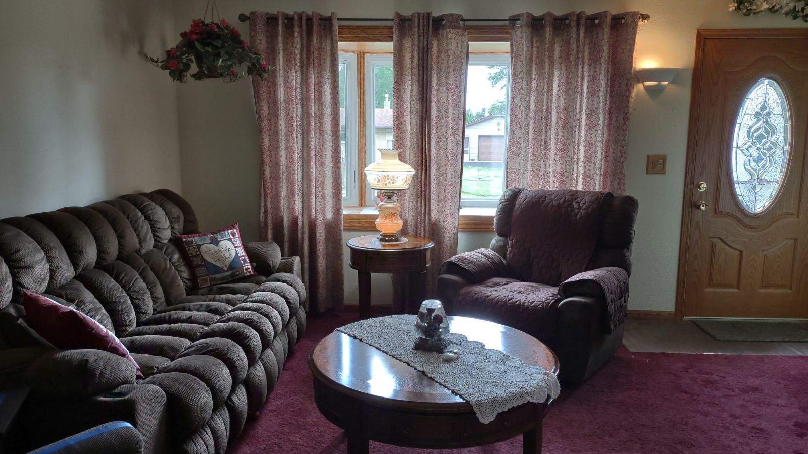 7912 Elm Street Harvard, IL 60033 - Photo 6 of 37 a living room with furniture and a large window
