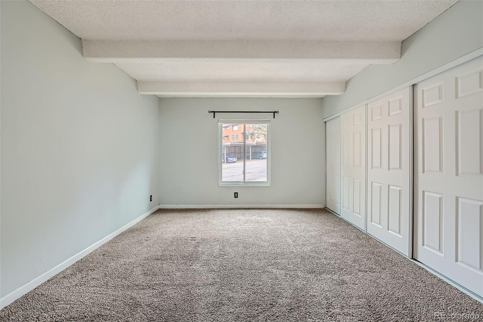 2525 South Dayton Way, Unit 1003 Denver, CO 80231 - Photo 12 of 22 a view of a window in an empty room
