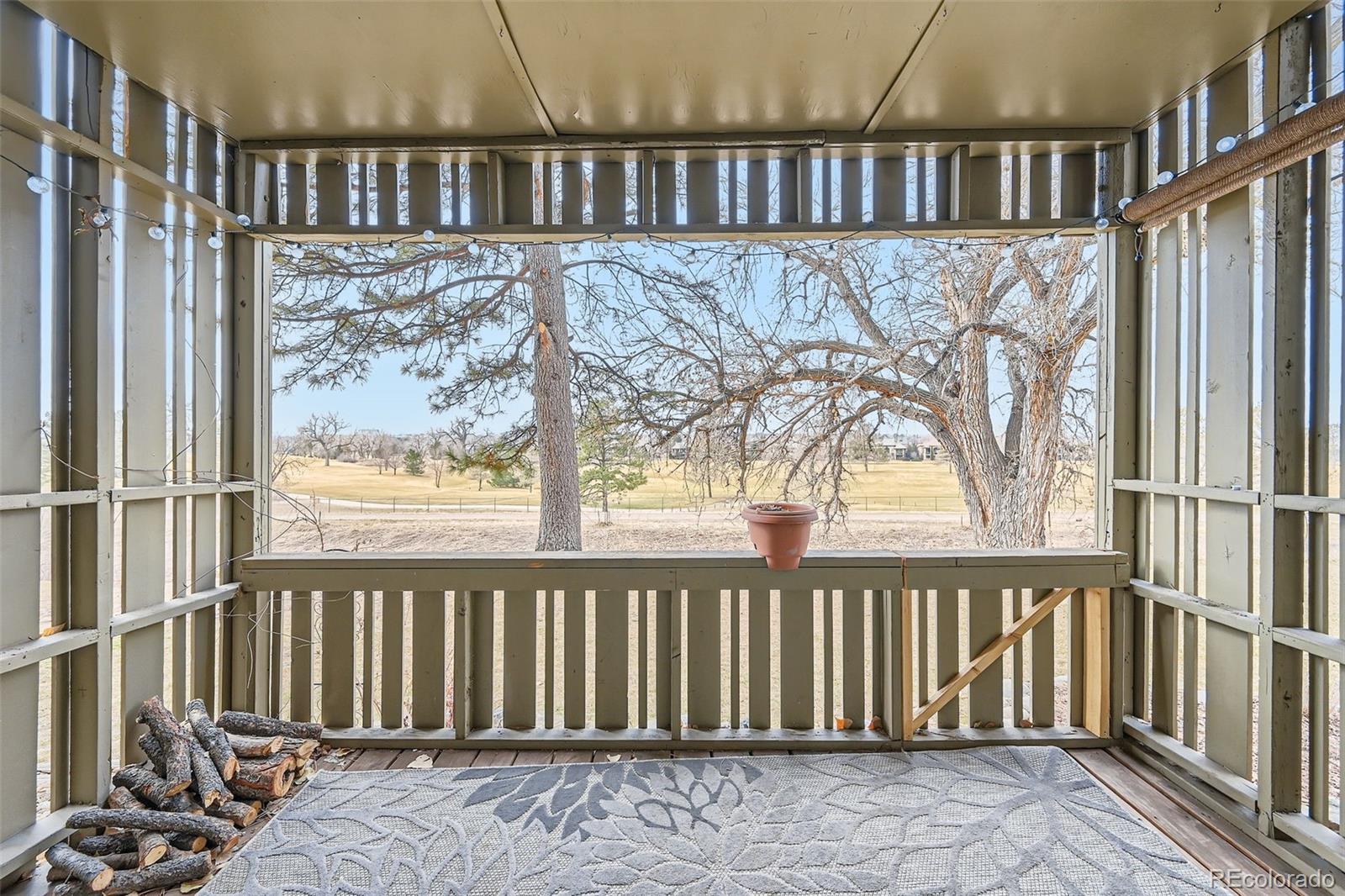 2525 South Dayton Way, Unit 1003 Denver, CO 80231 - Photo 19 of 22 a view of a balcony with wooden floor