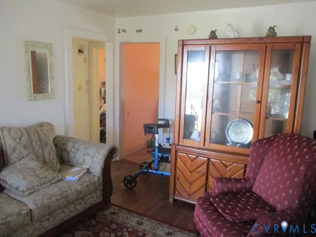 a bed room with furniture and a window