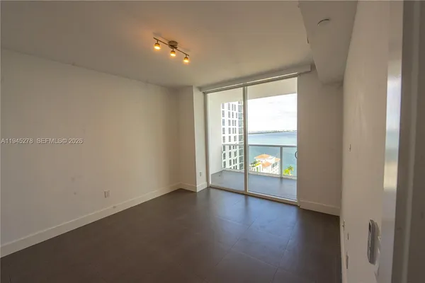 an empty room with windows