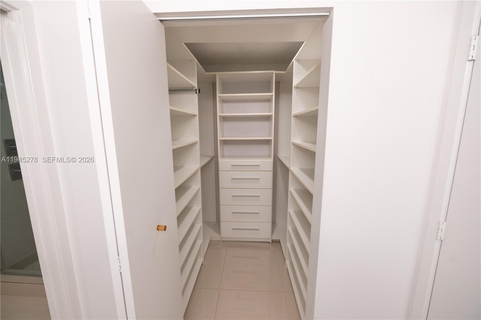 600 Northeast 27th Street, Unit 1602 Miami, FL 33137 - Photo 18 of 34 a view of walk in closet