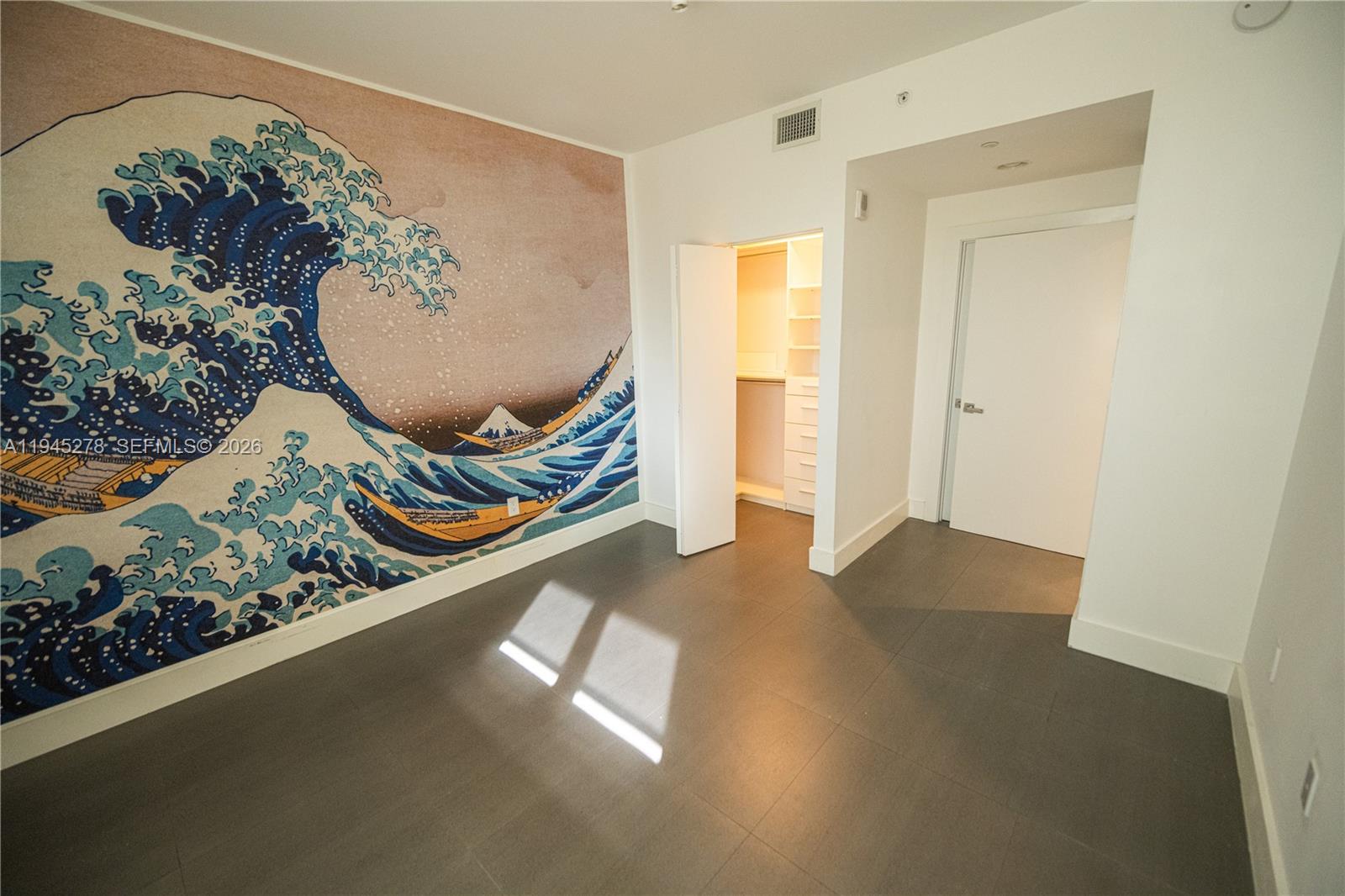 600 Northeast 27th Street, Unit 1602 Miami, FL 33137 - Photo 29 of 34 a view of an entryway with wooden floor