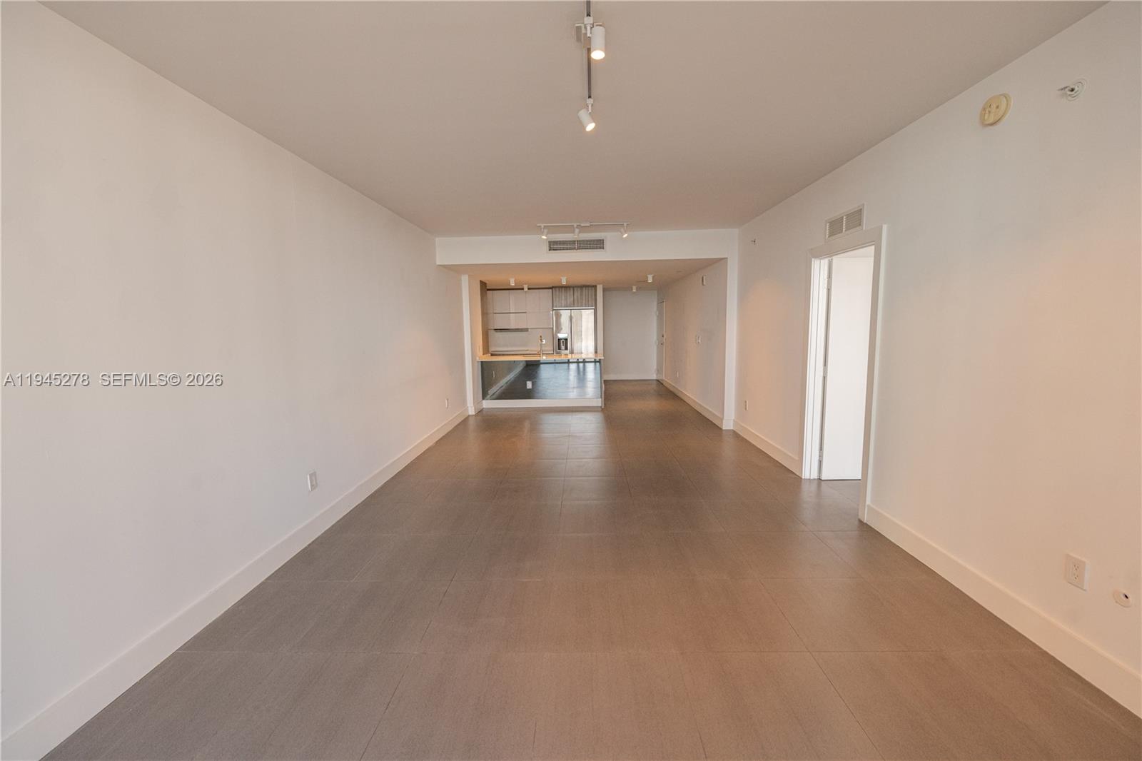 600 Northeast 27th Street, Unit 1602 Miami, FL 33137 - Photo 10 of 34 a view of an empty room with a window