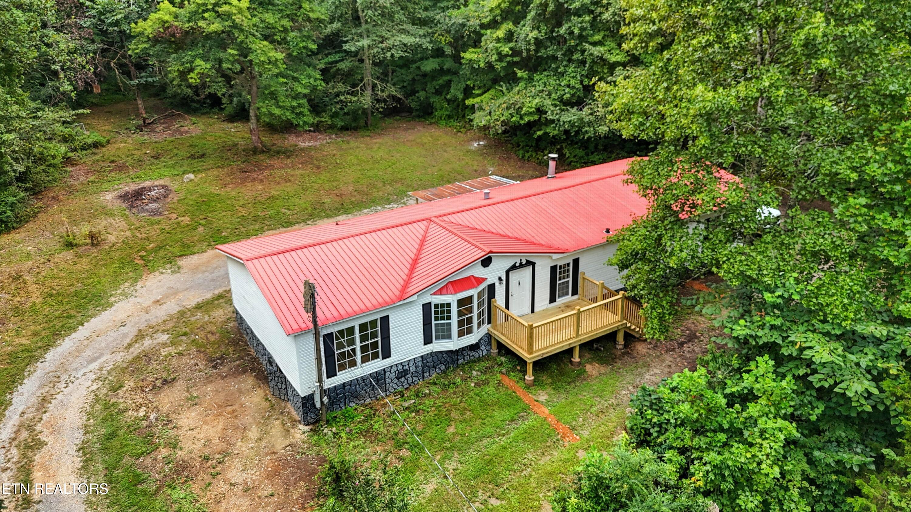 9848 Heiskell Road Heiskell, TN 37754 - Photo 2 of 35 DJI_20250813021204_0041_D