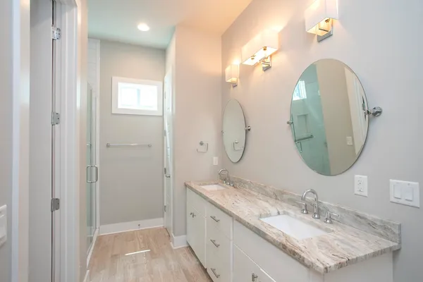 a bathroom with a shower and a bathtub