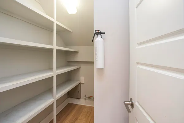 a view of a hallway with entryway