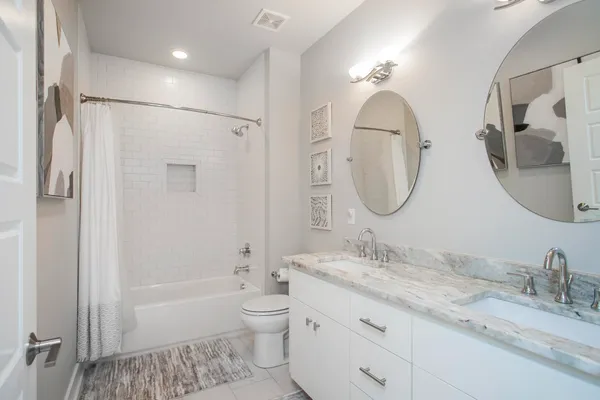 a view of a room with window and wooden floor