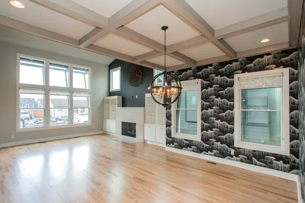 a view of a porch with wooden floor and stairs