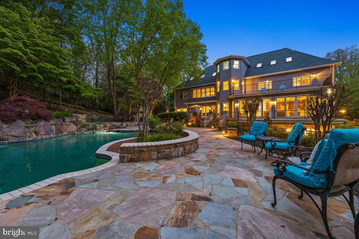 13120 Esworthy Road Potomac, MD 20854 - Photo 1 of 83 A fairytale view from the pool at dusk